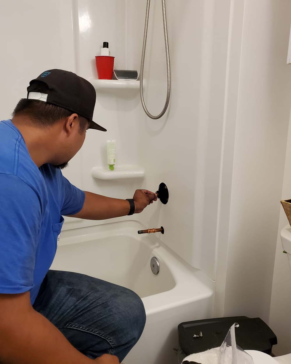 image of Waialae Plumber doing work on a shower