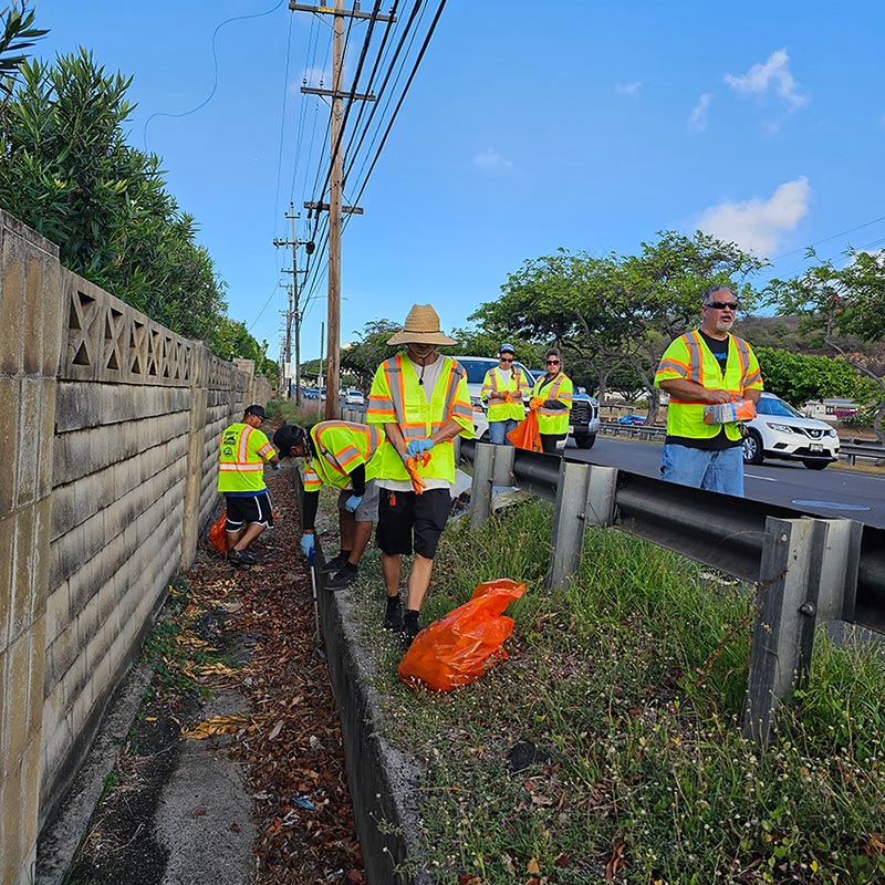 image of Waialae Plumbing team doing cleanup for adopt-a-highway